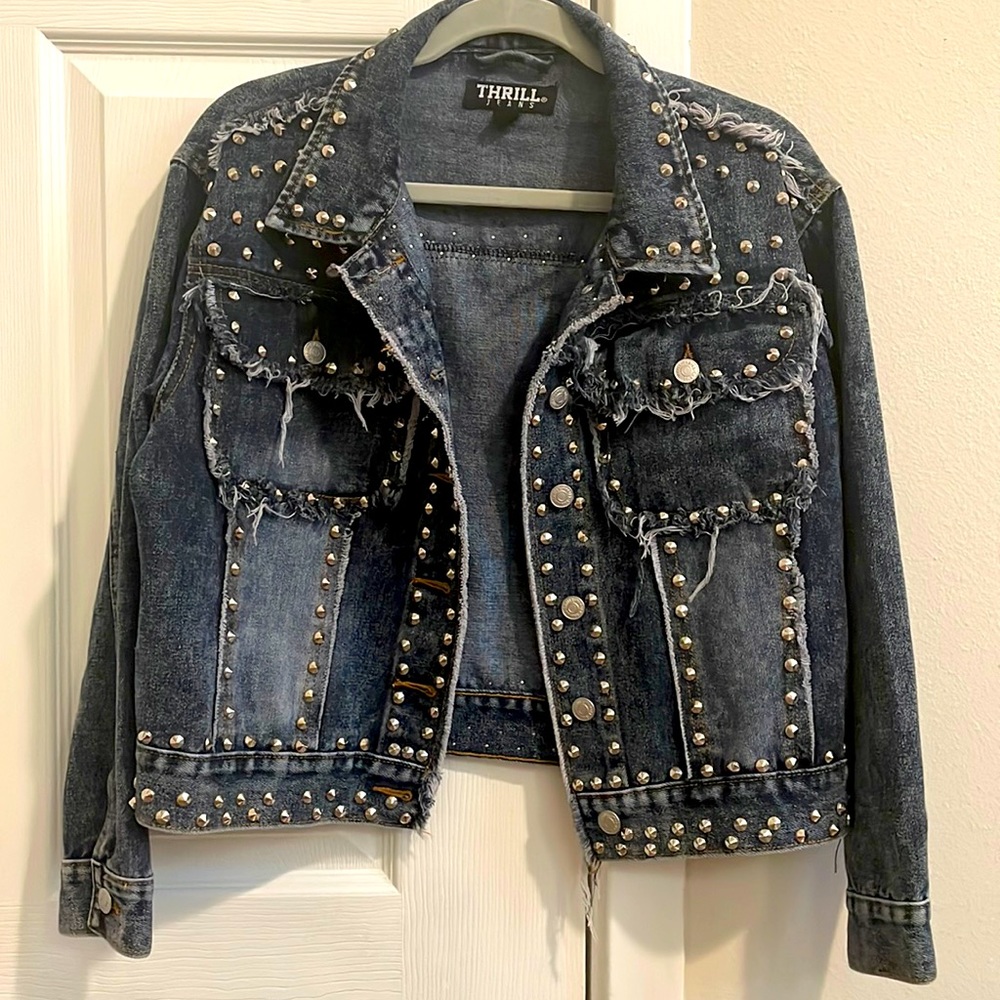 Denim jacket with applications